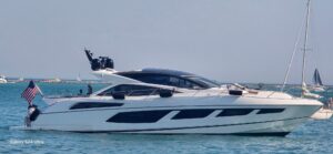 2017 Sunseeker Predator 68 luxury motor yacht exterior profile starboard side view showing full length hull design and sup...