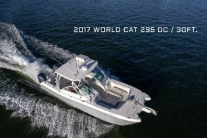Bow seating and anchor setup on 2017 World Cat 295 DC catamaran with dual console helm visible forward.