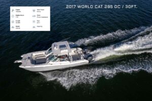 2017 World Cat 295 DC dual console catamaran helm station with Garmin electronics and steering wheel in Miami.