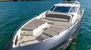 2019 Numarine 78 motor yacht bow section with forward seating and anchor handling on Miami waterfront.