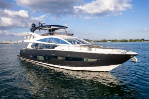 Bow view of 2020 Pearl 80 motor yacht showing forward seating and cabin profile in Miami.