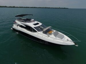 Sunseeker 74 Sport Yacht bow view showing forward seating and cabin entry on Lake St Clair.