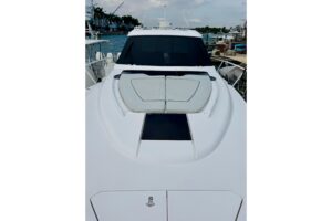 2021 Intrepid 410 Evolution center console helm station with dual Garmin displays, steering wheel, and forward visibility ...
