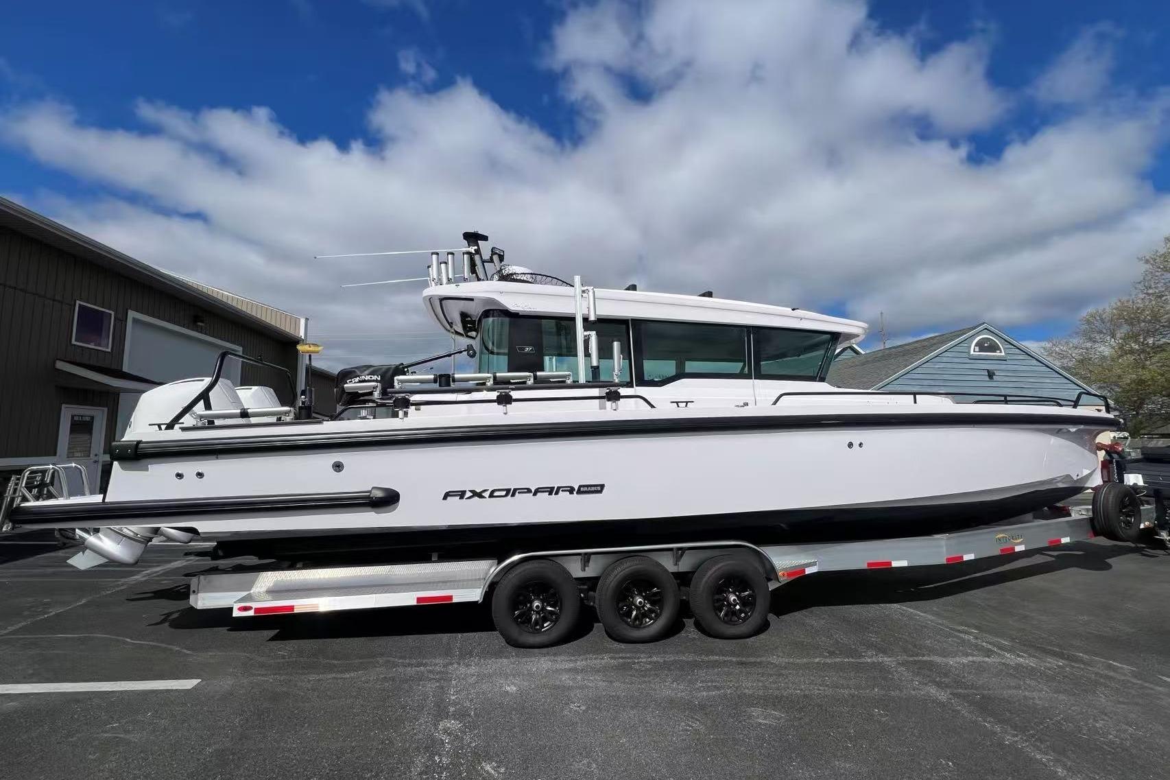 2022 Axopar 37 XC Cross Cabin starboard profile showing full-length exterior with hardtop and helm station forward.