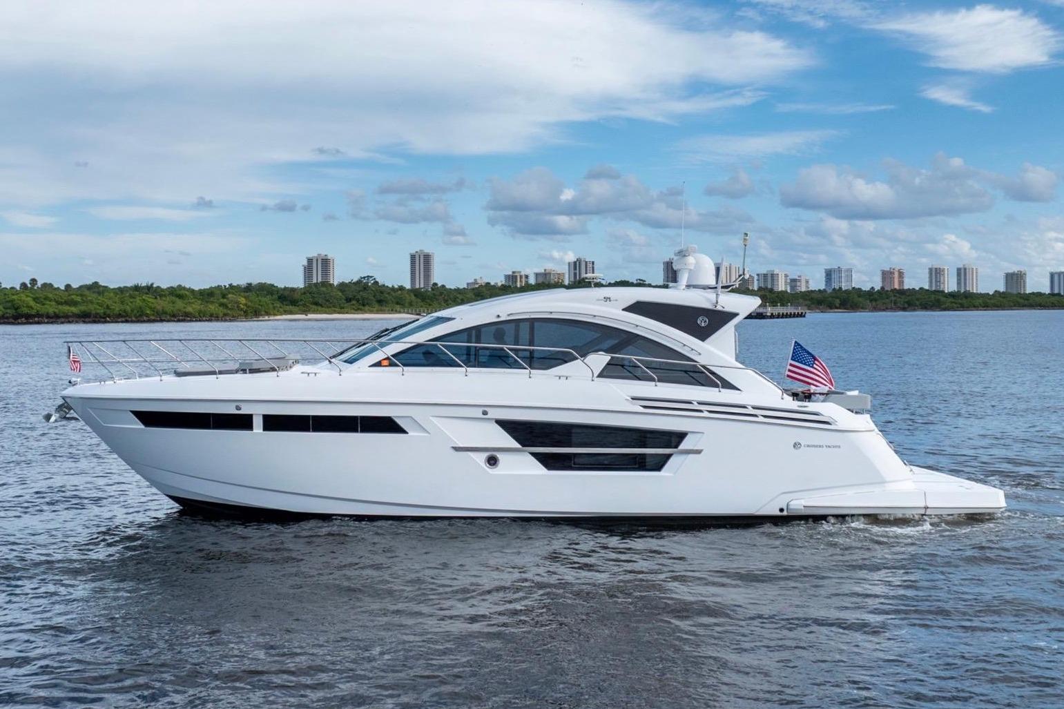 2022 Cruisers Yachts 54 Cantius motor yacht profile starboard side view showing full exterior with hardtop and twin outboa...