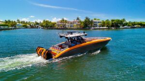 Midnight Express 43 Open center console with bow seating and forward cabin entry in Miami.