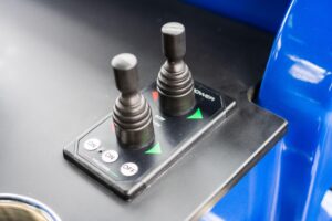 2023 Cigarette 59 Tirranna helm station with dual Garmin displays, leather helm seating, and center console steering in th...
