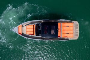 Bow view of 2023 De Antonio Yachts D50 with forward seating and windscreen in Miami.
