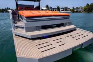 Bow view of 2023 De Antonio Yachts D50 with forward seating and windscreen in Miami.