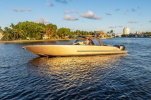 Galley with stainless steel appliances and white cabinetry aboard 2023 De Koning 43 motor yacht.