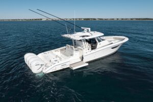 Bow view of 2023 Pursuit S 428 Sport center console with integrated windscreen and forward seating in Harwich, MA.