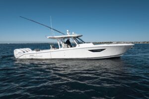 Stern view of 2023 Pursuit S 428 Sport showing transom, swim platform, and outboard engine configuration.