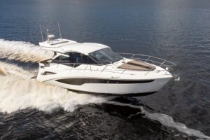 2024 Galeon 425 HTS 42-foot hardtop cruiser with dual helm stations and integrated tower, moored in Fort Myers showing sta...
