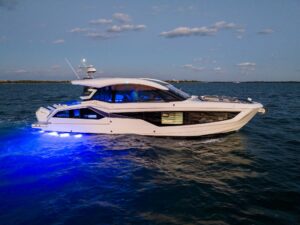 Bow view of 2024 Galeon 435 GTO with forward seating and windscreen in Norwalk, Connecticut.