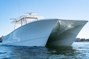 Bow view of 2025 Front Runner 43 catamaran showing twin hulls and forward seating area in Atlantic Highlands, NJ.
