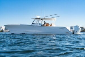 Bow view of 2025 Front Runner 43 catamaran with dual hulls and forward seating in Atlantic Highlands, New Jersey.