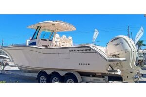 Bow view of 2025 Grady-White Canyon 326 center console with forward seating and windshield in Riviera Beach, Florida.
