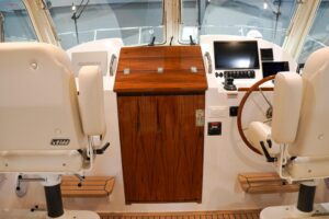 Bow view of 2025 MJM 35 cruising yacht showing forward seating and cabin entry with classic New England sportfishing profile.