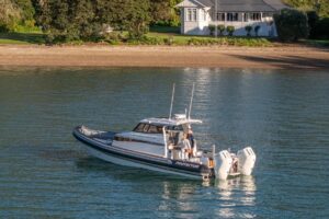 2025 Protector 380 Targa center console with V10 400 HP Volvo Penta outboard and jet propulsion, bow seating and forward c...