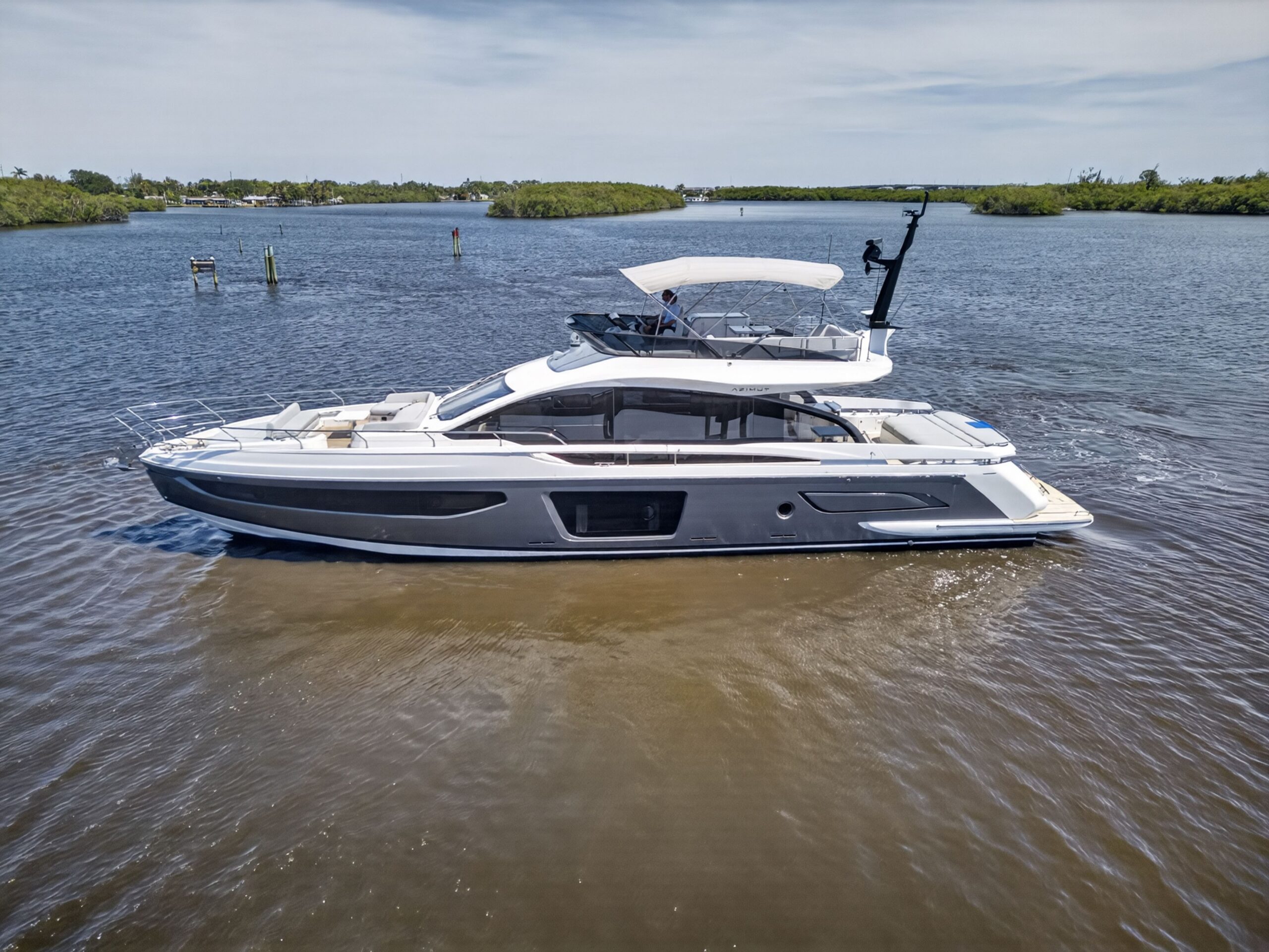 2026 Azimut S7 70-foot luxury motor yacht exterior profile starboard side view in Stuart Florida.