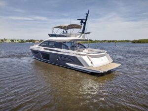 70-foot Azimut S7 luxury yacht stern profile with extended swim platform and teak transom in Stuart, Florida.