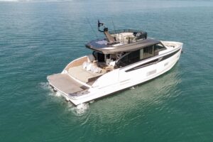 Bow seating area on 57-foot Azimut Seadeck 6 with forward lounge and cushioned sunpad.