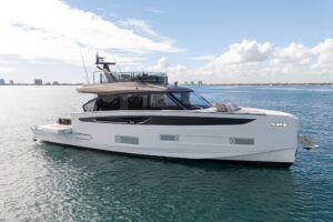 2026 Azimut Seadeck 6 57-foot yacht salon with contemporary seating and large windows overlooking the water.