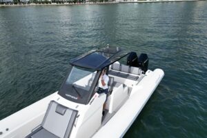 Northstar Orion 10 cabin interior with forward berth and natural light from portside window.