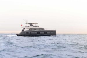2026 Sunreef 60 Sunreef Power catamaran with dual hulls and hardtop, moored in Fort Lauderdale showing starboard profile a...