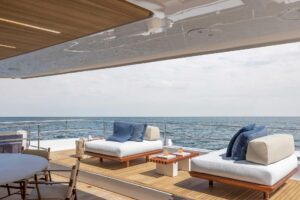 Sunreef 80 Power catamaran bow with teak foredeck and integrated seating in Fort Lauderdale.