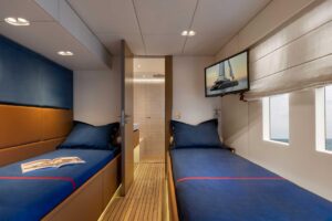 Sunreef 80 Power catamaran salon with comfortable seating, large windows, and modern interior finishes.
