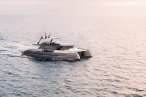 Sunreef Ultima 88 catamaran bow section with dual hulls and forward seating area in Fort Lauderdale.
