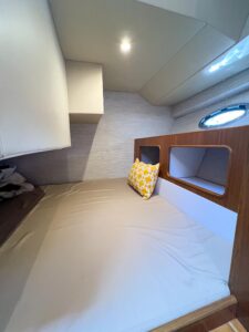 True North 39 Outboard Express center console helm with dual Garmin displays and helm seating overlooking the bow.