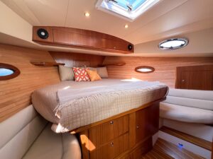 True North 39 Outboard Express center console helm with dual Garmin displays and helm seating overlooking the bow.