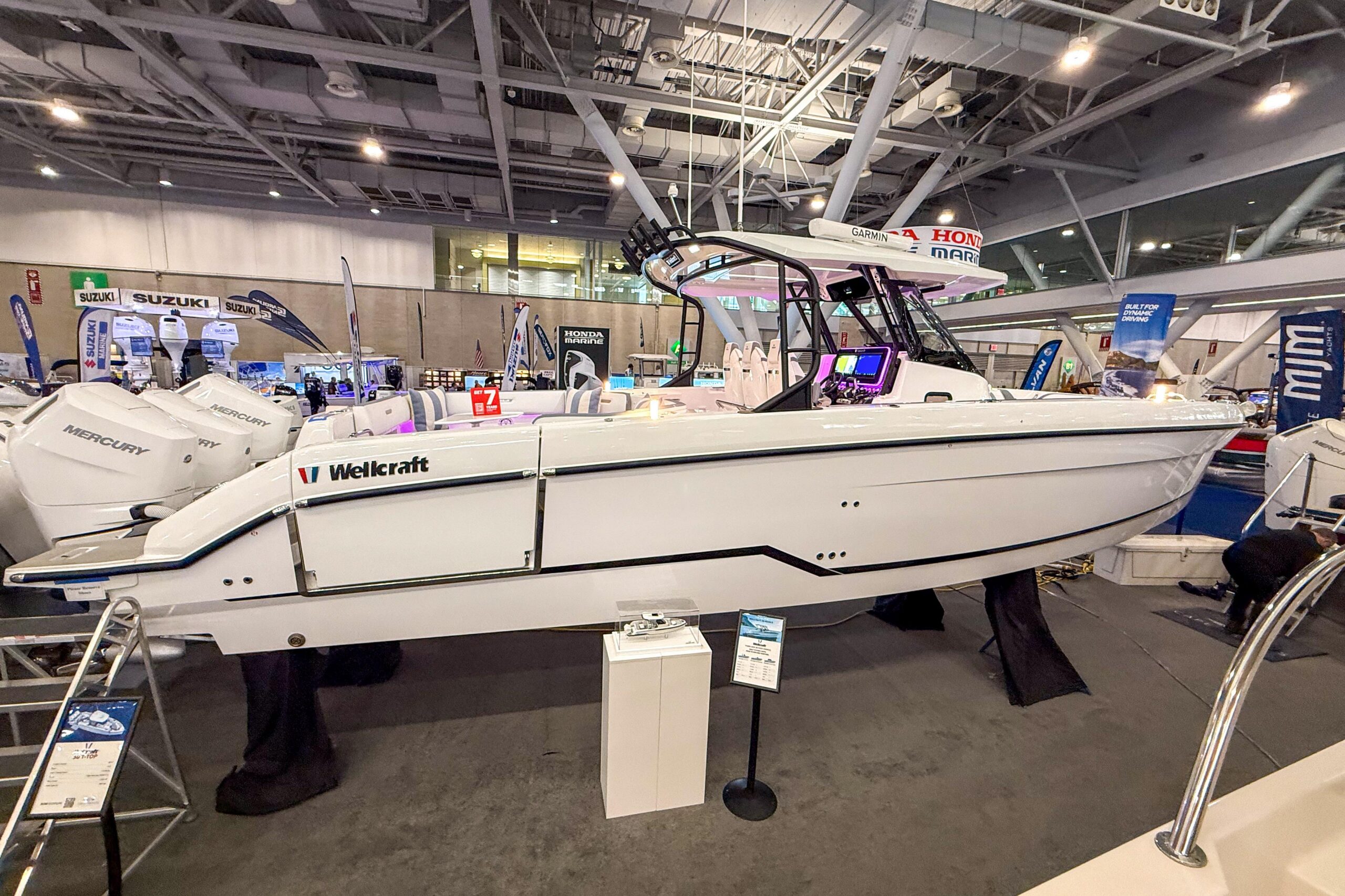 2026 Wellcraft 38 T-Top center console with hardtop and tower in profile at South Dartmouth, MA.